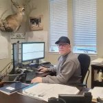 man at desk