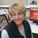 photo of lady at desk